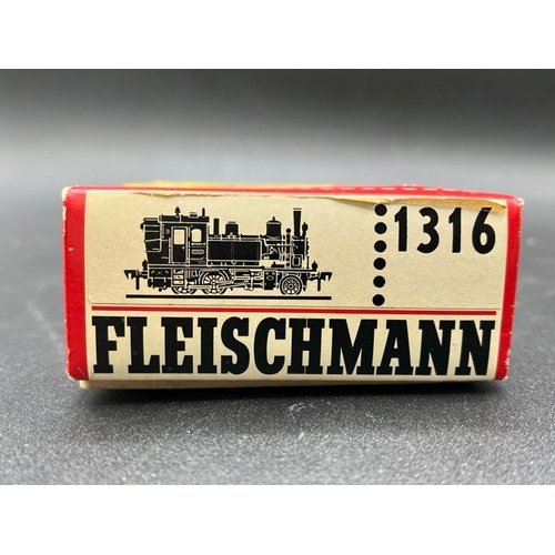 154 - Two HO gauge boxed Fleischmann Locomotives - both Tested Runners
(750g)
Fleischmann 4078 Class BR 78... 