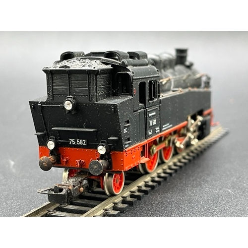 159 - Two HO gauge boxed Locomotives from Roco and Gutzold - both Tested Runners
(800g)
Roco 63338 Class B... 