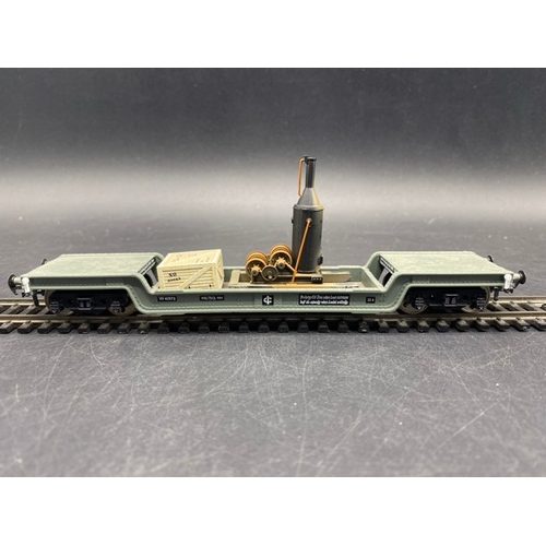 430 - 4 Boxed Bachmann Branchline 33-901C 45 ton bogie well wagon W41973 in BR grey
(700g)
Three with inte... 