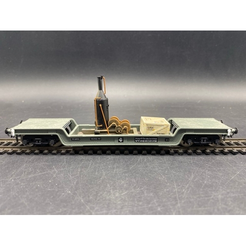 430 - 4 Boxed Bachmann Branchline 33-901C 45 ton bogie well wagon W41973 in BR grey
(700g)
Three with inte... 