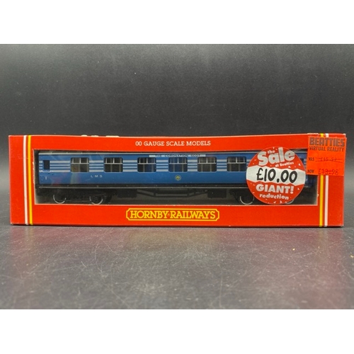 437 - 4 Hornby boxed Rolling stock
(800g)
Hornby R4155 LMS TPO operating Royal mail coach set 30246
Hornby... 