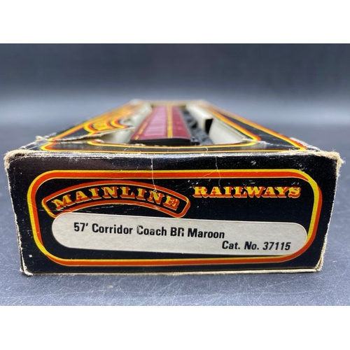 438 - Four Boxed OO Mainline Maroon Vans and Coach
(800g)
Mainline 37115 Ex-LMS 57' Composite Corridor M35... 