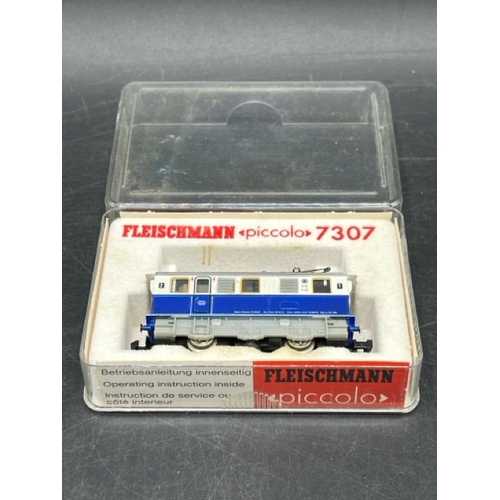 33 - Two N gauge Fleischmann piccolo cased Railcars - Tested Non Runners
(250g)
Fleischmann 7969 Class ET... 