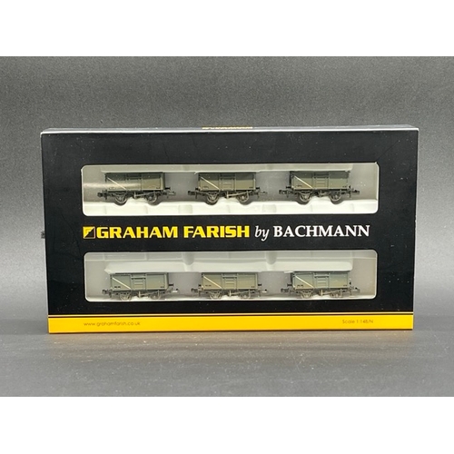 58 - Graham Farish by Bachmann N Gauge cased Rolling stock
(600g)
14 wagons/vans Appear as new in box/cas... 