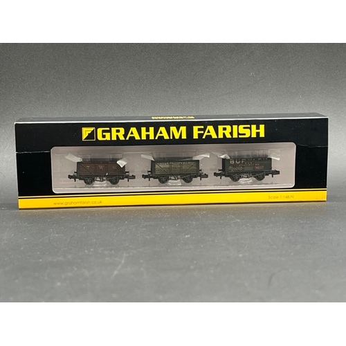 58 - Graham Farish by Bachmann N Gauge cased Rolling stock
(600g)
14 wagons/vans Appear as new in box/cas... 