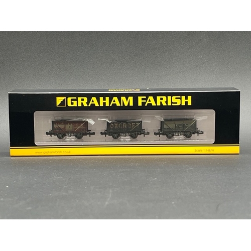 58 - Graham Farish by Bachmann N Gauge cased Rolling stock
(600g)
14 wagons/vans Appear as new in box/cas... 