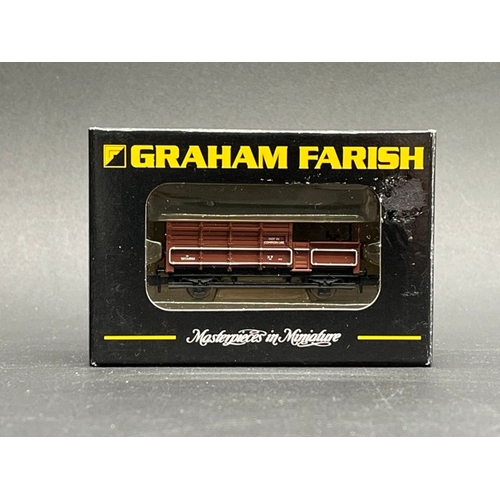 58 - Graham Farish by Bachmann N Gauge cased Rolling stock
(600g)
14 wagons/vans Appear as new in box/cas... 