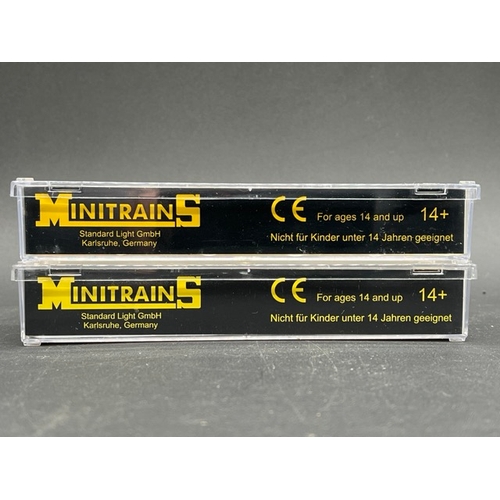 27 - Two MiniTrains HOe 4-pack wagons
(150g)
Minitrains 5123 4 Modern Sugar Cane Cars
Minitrains 5101 4 T... 