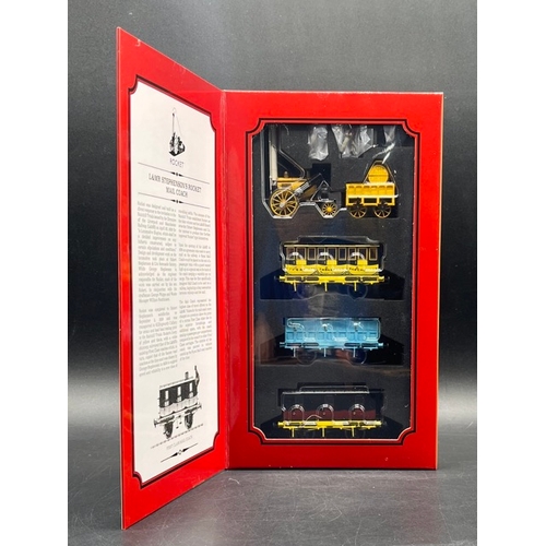 384 - Hornby R3956 Stephenson's Rocket 0-2-2 'Royal Mail' train pack with three Liverpool and Manchester R... 