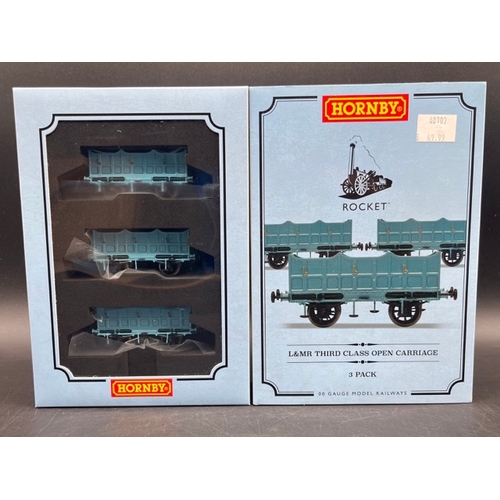 386 - Three 'As New' Boxes containing 7 Hornby Liverpool and Manchester Railway wagons
(400g)
Hornby R6001... 