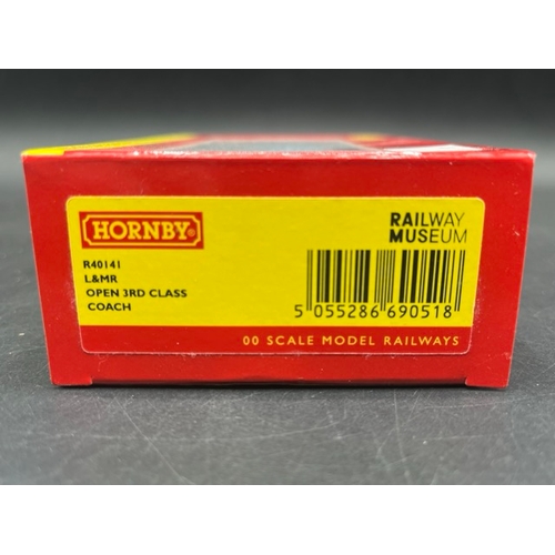 386 - Three 'As New' Boxes containing 7 Hornby Liverpool and Manchester Railway wagons
(400g)
Hornby R6001... 