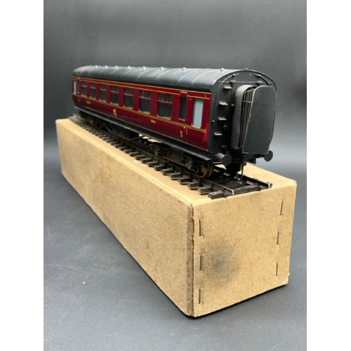 73 - An Edward Exley & Co. O Gauge LMS eight wheel passenger coach, LMS Maroon with black roof, Third cla... 