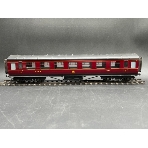 73 - An Edward Exley & Co. O Gauge LMS eight wheel passenger coach, LMS Maroon with black roof, Third cla... 