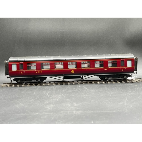 73 - An Edward Exley & Co. O Gauge LMS eight wheel passenger coach, LMS Maroon with black roof, Third cla... 