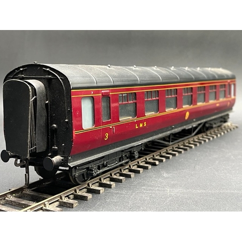 73 - An Edward Exley & Co. O Gauge LMS eight wheel passenger coach, LMS Maroon with black roof, Third cla... 