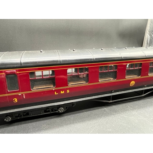 73 - An Edward Exley & Co. O Gauge LMS eight wheel passenger coach, LMS Maroon with black roof, Third cla... 