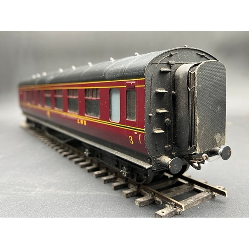 74 - An Edward Exley & Co. O Gauge LMS eight wheel Brake/Passenger coach, LMS  Maroon with black roof, Th... 