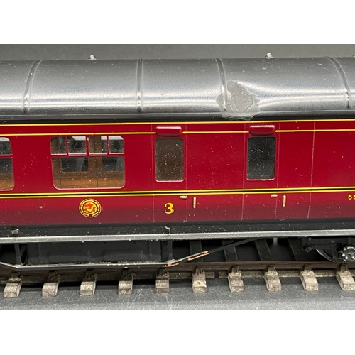 74 - An Edward Exley & Co. O Gauge LMS eight wheel Brake/Passenger coach, LMS  Maroon with black roof, Th... 