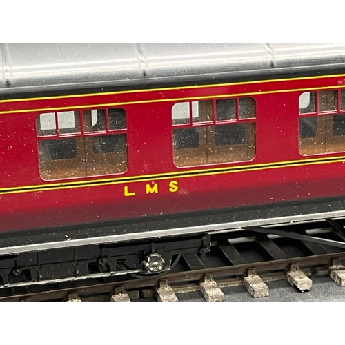 74 - An Edward Exley & Co. O Gauge LMS eight wheel Brake/Passenger coach, LMS  Maroon with black roof, Th... 