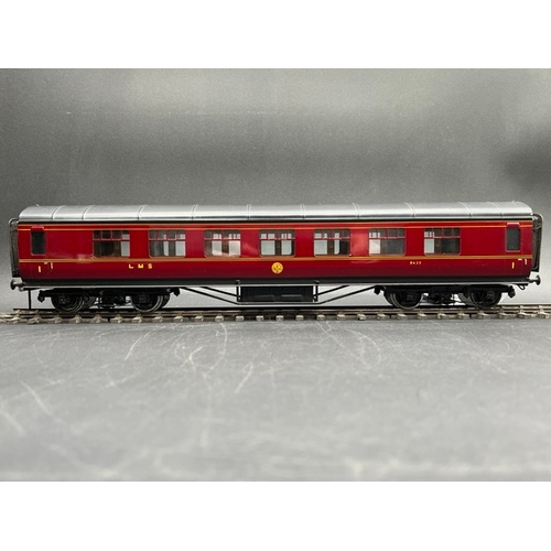 75 - An Edward Exley & Co. O Gauge LMS eight wheel passenger coach, LMS Maroon with black roof, First cla... 