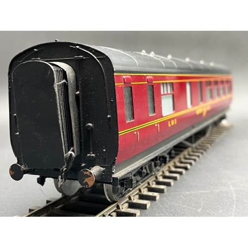 76 - An Edward Exley & Co. O Gauge LMS eight wheel Buffet car, LMS Maroon with black roof, No.277, Boxed,... 