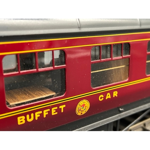 76 - An Edward Exley & Co. O Gauge LMS eight wheel Buffet car, LMS Maroon with black roof, No.277, Boxed,... 