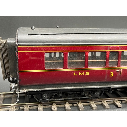 77 - O Gauge LMS eight wheel passenger coach, LMS Maroon with black roof, Third class Corridor, No.20011,... 