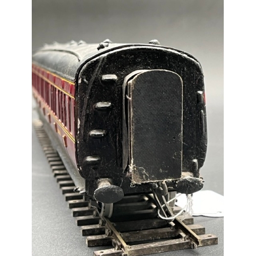 77 - O Gauge LMS eight wheel passenger coach, LMS Maroon with black roof, Third class Corridor, No.20011,... 