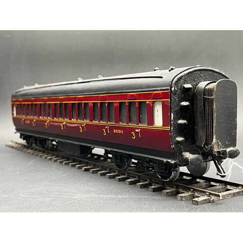 77 - O Gauge LMS eight wheel passenger coach, LMS Maroon with black roof, Third class Corridor, No.20011,... 