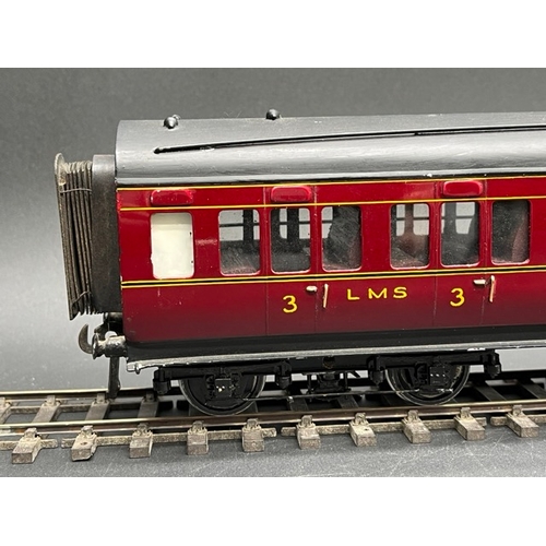 77 - O Gauge LMS eight wheel passenger coach, LMS Maroon with black roof, Third class Corridor, No.20011,... 