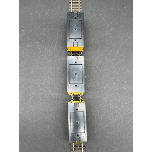 37 - Triang Stephensons Rocket and three coaches
(250g)
Locomotive in pieces (Poor) with wagon (Fair)
and... 