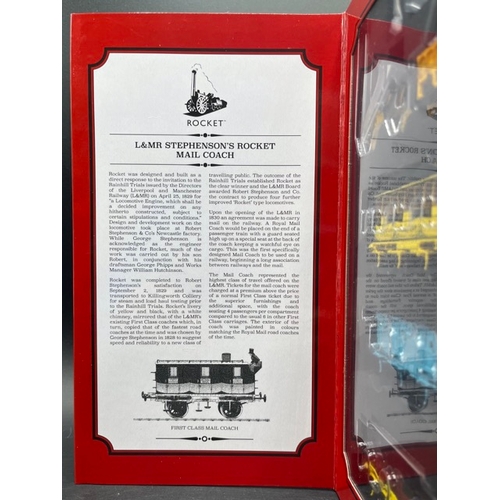 38 - Hornby R3956 Stephenson's Rocket 0-2-2 'Royal Mail' train pack with three Liverpool and Manchester R... 