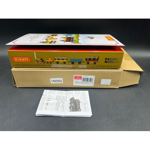 38 - Hornby R3956 Stephenson's Rocket 0-2-2 'Royal Mail' train pack with three Liverpool and Manchester R... 