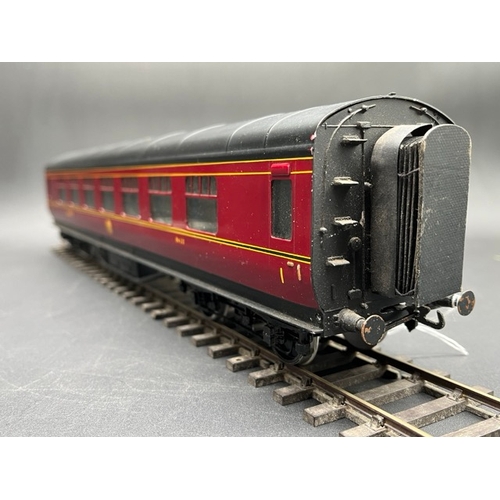 157 - An Edward Exley & Co. O Gauge LMS eight wheel passenger coach, LMS Maroon with black roof, First cla... 