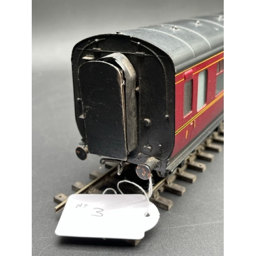 157 - An Edward Exley & Co. O Gauge LMS eight wheel passenger coach, LMS Maroon with black roof, First cla... 
