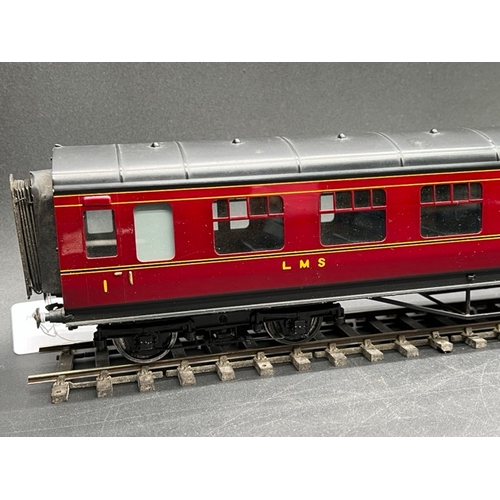 157 - An Edward Exley & Co. O Gauge LMS eight wheel passenger coach, LMS Maroon with black roof, First cla... 