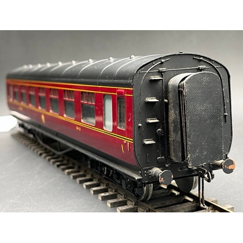 157 - An Edward Exley & Co. O Gauge LMS eight wheel passenger coach, LMS Maroon with black roof, First cla... 
