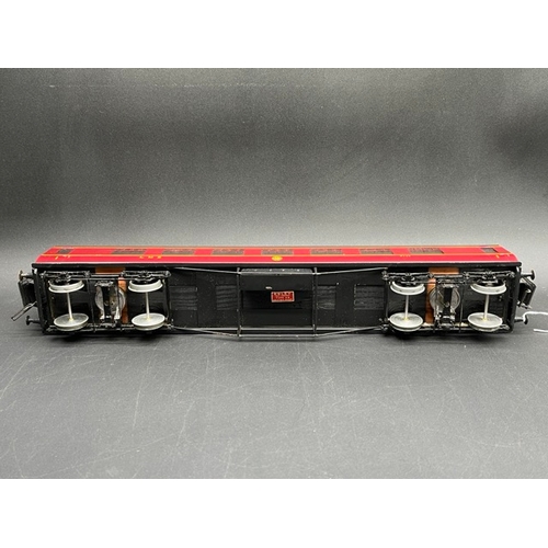 157 - An Edward Exley & Co. O Gauge LMS eight wheel passenger coach, LMS Maroon with black roof, First cla... 