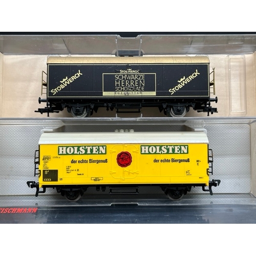 147 - 27 HO Fleischmann European wagons, vans and tankers each in a box or case 'Ready to Roll'
(3200g)