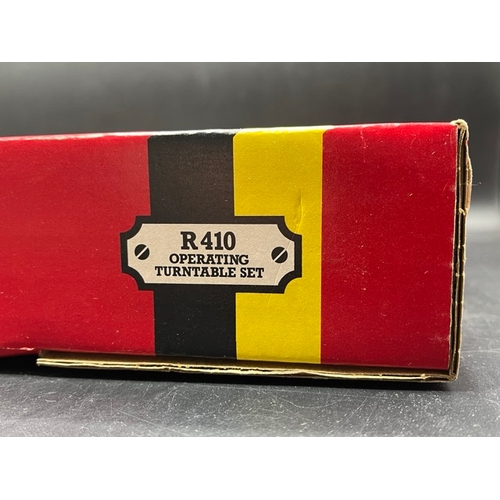 195 - Hornby R410 Operating Turntable set
(1000g)
Previously used, contents as shown
Track tarnished 
Appe... 