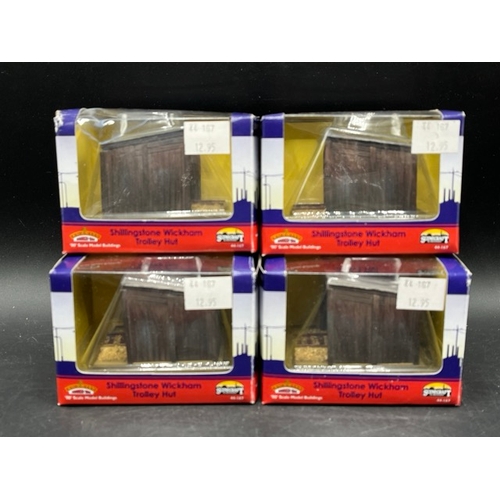 165 - Twenty Bachmann Scenecraft OO scale figure packs and four Shillingstone Wickham trolley huts
(1100g)... 