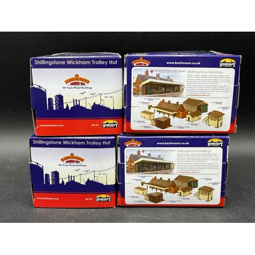 165 - Twenty Bachmann Scenecraft OO scale figure packs and four Shillingstone Wickham trolley huts
(1100g)... 