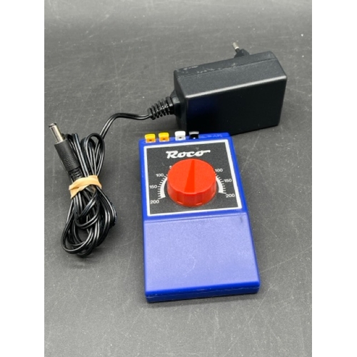 375 - Three OO/HO/N gauge controllers
(5000g)
Gaugemaster Model Q Four track controller - appears unused. ... 