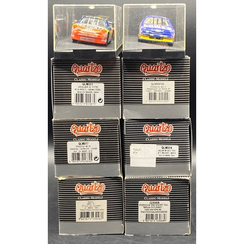 53 - 8 Quartzo 1:43 Race Cars, as shown, Two without sleeve
(1700g)