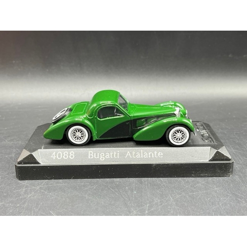 59 - 9 1:43 scale Bugatti models from IXO (4), Solido (4) and Eligor (1)
(1600g)
ixo LM1937 Bugatti type ... 