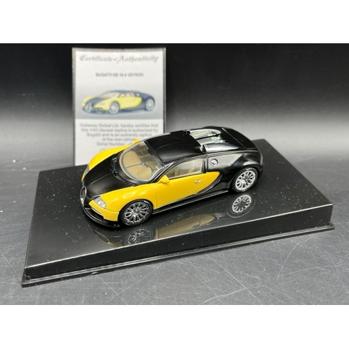 19 - 3 AUTOart Bugatti 1:43 models in boxes 
(700g)
50904 Bugatti EB 16.4 Veyron Showcar (Black/Yellow)
5... 