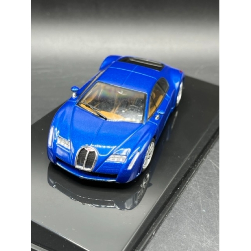 19 - 3 AUTOart Bugatti 1:43 models in boxes 
(700g)
50904 Bugatti EB 16.4 Veyron Showcar (Black/Yellow)
5... 