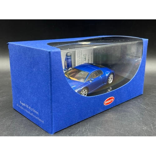 19 - 3 AUTOart Bugatti 1:43 models in boxes 
(700g)
50904 Bugatti EB 16.4 Veyron Showcar (Black/Yellow)
5... 