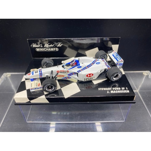 6 - 6 Paul’s Model Art MINICHAMPS racing cars (1:43 scale) (700g)
Includes:
Stewart Ford SF 1  - J. Magn... 