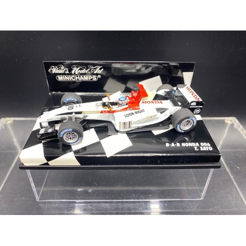 6 - 6 Paul’s Model Art MINICHAMPS racing cars (1:43 scale) (700g)
Includes:
Stewart Ford SF 1  - J. Magn... 